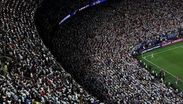 Is this the best sports photo EVER? World Cup fans go wild for snap of Lionel Messi at Arrowhead Stadium