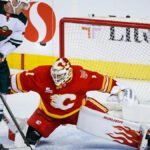 Devin Cooley’s 36 saves lead Flames to 2-1 win over Wild with two early power-play goals