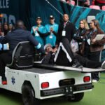 NFL umpire Larry Smith injured after slipping on slick Wembley field during Jaguars-Texans game