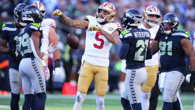 Mike Evans shines through broken ribs with 113 yards and TD in 49ers win over Seahawks